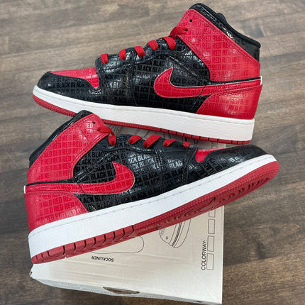 (GS) Bred Text Jordan 1 Mid (USED)