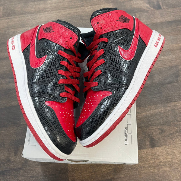 (GS) Bred Text Jordan 1 Mid (USED)